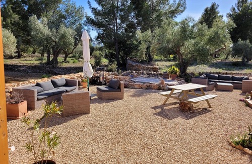 Costa Dorada Ski Chalet | Romantic chalet with private pool surrounded by olive trees.