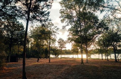 Bastrop House | Romantic Lakefront Safari Tent with Fire Pit and Peaceful Views near Bastrop, Texas