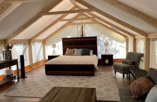 Bastrop House | Romantic Lakefront Safari Tent with Fire Pit and Peaceful Views near Bastrop, Texas