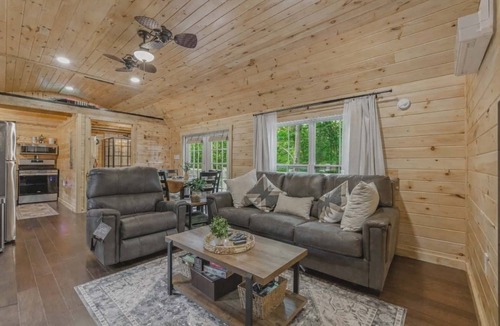 Pittsville Cabin | Romantic Luxury Lake Access Cabin w/Hot Tub, Spacious Deck, and Pine walls