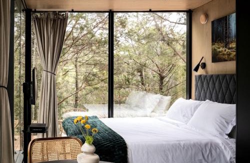 Bastrop House | Romantic Mirror Cabin Retreat by the Lake in the Enchanted Forests of Texas