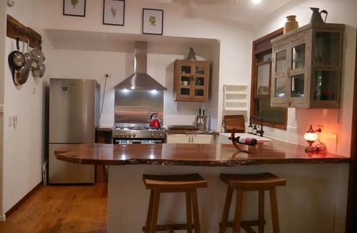 Cow Bay House | Romantic rainforest retreat with magical waterfall