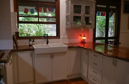 Cow Bay House | Romantic rainforest retreat with magical waterfall