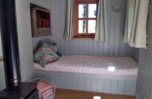 Busserolles Cabin | Romantic riverfront shepherds' hut with outdoor kitchen w/firepit