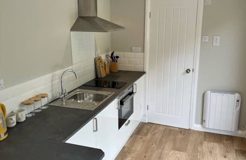 Legbourne Cabin | Romantic Riverside En-suite Cabin with Private Hot Tub