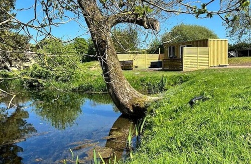 Legbourne Cabin | Romantic Riverside En-suite Cabin with Private Hot Tub
