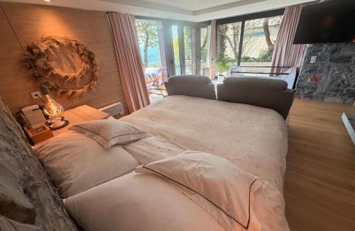 Cademario Apartment | ROMANTIC SUlTE WITH ITS OWN SPA AND OPEN VIEW TO LUGANO