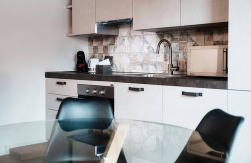 Montagnola Apartment | Romantic village house with small garden (LO STALLINO)