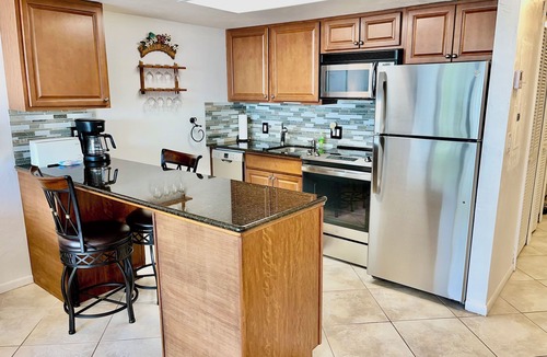 Vanderbilt Beach Condo | ROOFTOP POOL, BAY VIEW & STEPS TO VANDERBILT BEACH!