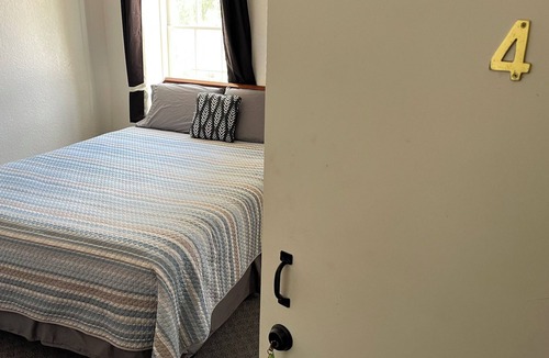 Spillville Hotel | Room 2: Sleep Where Prohibition Secrets Were Made - Historic Escape!
