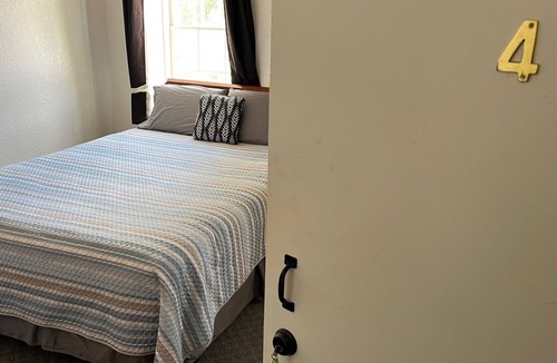 Spillville Hotel | Room 4: Sleep Where Prohibition Secrets Were Made - Historic Escape!