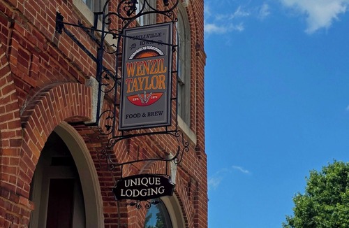 Spillville Hotel | Room 4: Sleep Where Prohibition Secrets Were Made - Historic Escape!