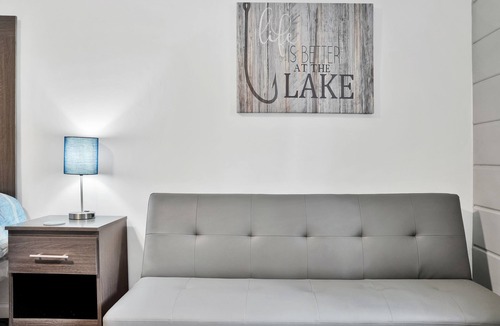 Houghton Lake Hotel | Room #8: Updated King Suite w/small couch