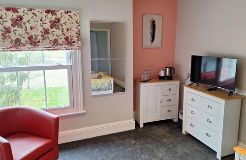 Cranleigh House | Room-comfortable Guest Room With a Bath