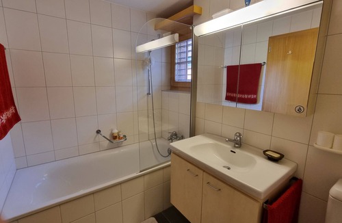 Lauenen Bed & Breakfast | Room with extra-large double-bed, cable TV, private bathroom, organic breakfast,