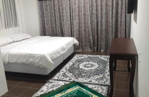 Kampung Tepoh Hotel | RoomStay Noraz