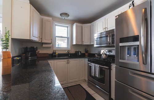 Revere Apartment | Roomy Boston 5BD-3BA-Pool Table-Free Parking