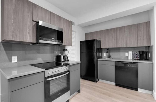West Avenue Apartment | Rosy Suite with POOL ! Parking Passes Available