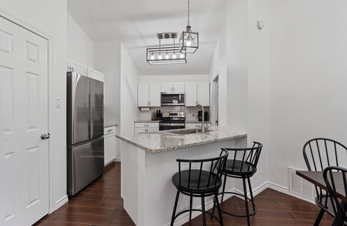Greenslopes At Lake Creek House | Round Rock Retreat: Near Downtown RR Kalahari Lodge Card Club Hot tub Game Room