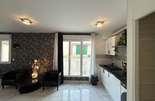 Le Bourget Apartment | Royal Sapphire Apartment With Royal Garden