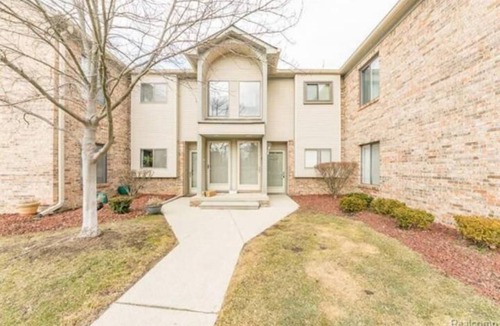 Canton Condo | Ruby's private 2-bedroom home with recently renovated floors.