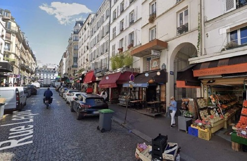 Montmartre Apartment | Rue Lepic - quintessential winding cobblestone street- Take a step into the past