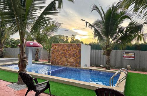 Kampung Bukit Tok Beng Ski Chalet | Rumah Kebun Gucher