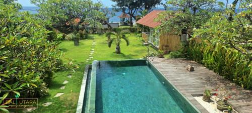 Kalisada House | Rumah Putih Beachfront Bungalow