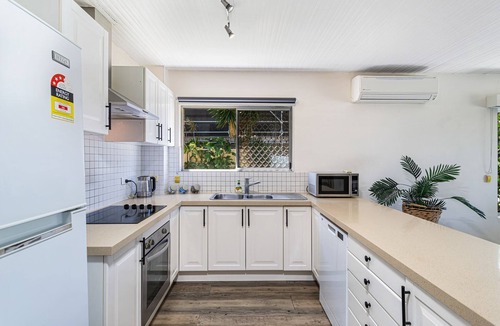 Runaway Bay Apartment | Runaway Bay Waterfront Delight