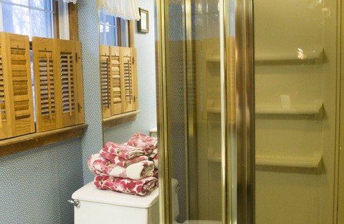 Spencer Bed & Breakfast | Russian and South African room in cabin surrounded by state forest