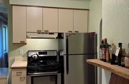 Level Green Cottage | Rustic 2BR 1BA Cottage w Porch!