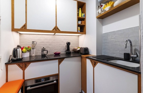 Arts-et-Metiers Apartment | Rustic Allure, by Veeve