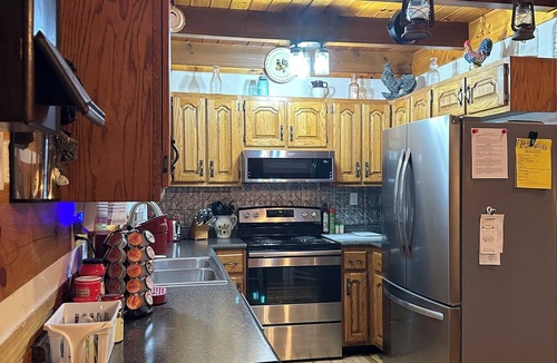Owensville Cabin | Rustic Cabin/4-bed/Fireplace/Hot Tub/Bar Area