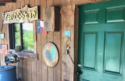 Leander Cabin | Rustic cabin located at Idyll Glen RV Park in the hill country.