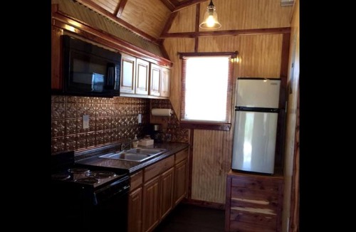Hughes County Cabin | Rustic Cabin Rental with a Fishing Pond in Allen, Oklahoma