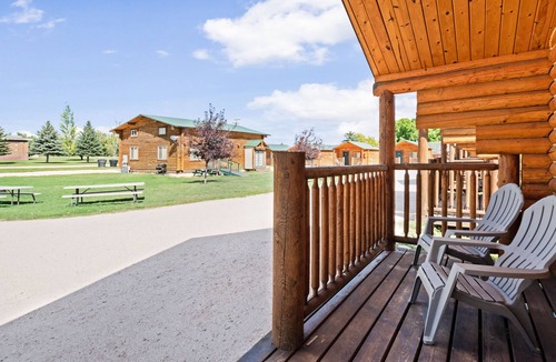 St. Charles Cabin | Rustic camping studio with large front porch & kitchenette