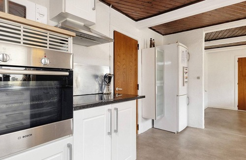 Aabybro House | Rustic cottage with fireplace