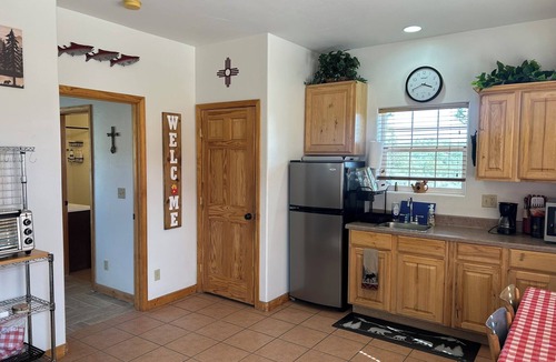 Rutheron Cabin | Rustic, Cozy Cabin Near Heron Lake with 5 Acres of Nature, Fire Pit & Views