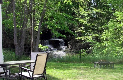 Northwest Ithaca Cottage | Rustic, Cozy Cottage with Backyard Waterfall and Cayuga Lake Views!