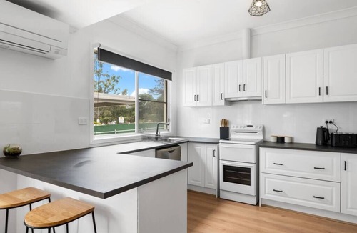 Clare House | Rustic Elegance: 3BR Cottage at Clare