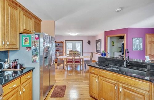 Covington House | Rustic Elegance: Farmhouse Retreat in Covington by RedAwning