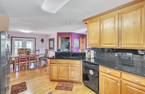 Covington House | Rustic Elegance: Farmhouse Retreat in Covington by RedAwning