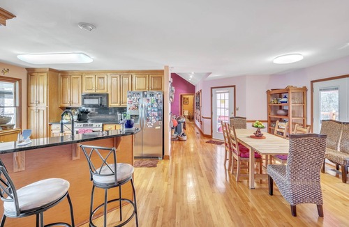 Covington House | Rustic Elegance: Farmhouse Retreat in Covington by RedAwning