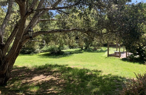 Inverness House | Rustic family vacation retreat with private tennis court!