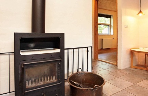 Sundstrup House | Rustic Holiday Home in Hojslev with Sauna