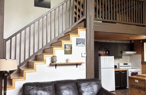 Sainte-Anne-du-Lac Ski Chalet | Rustic lakeside cottage.