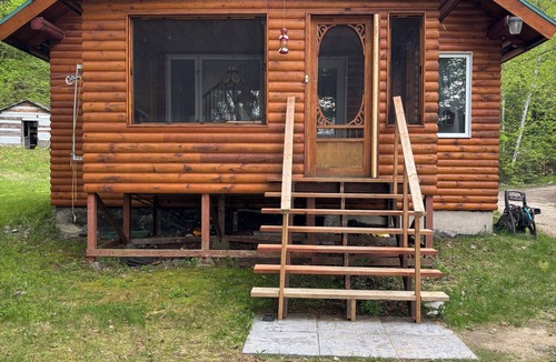 Sainte-Anne-du-Lac Ski Chalet | Rustic lakeside cottage.