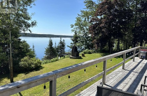 Terra Nova Cottage | Rustic Lakeside Cabin with Hot Tub