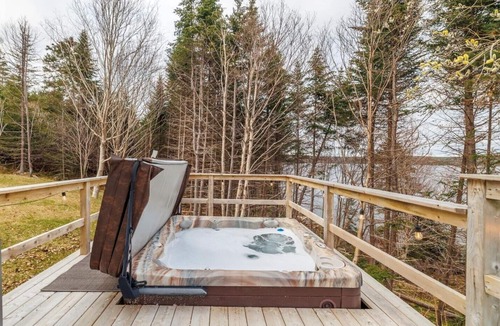 Terra Nova Cottage | Rustic Lakeside Cabin with Hot Tub