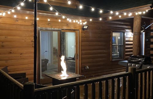 Heber Springs House | Rustic Log Cabin at Swinging Bridge